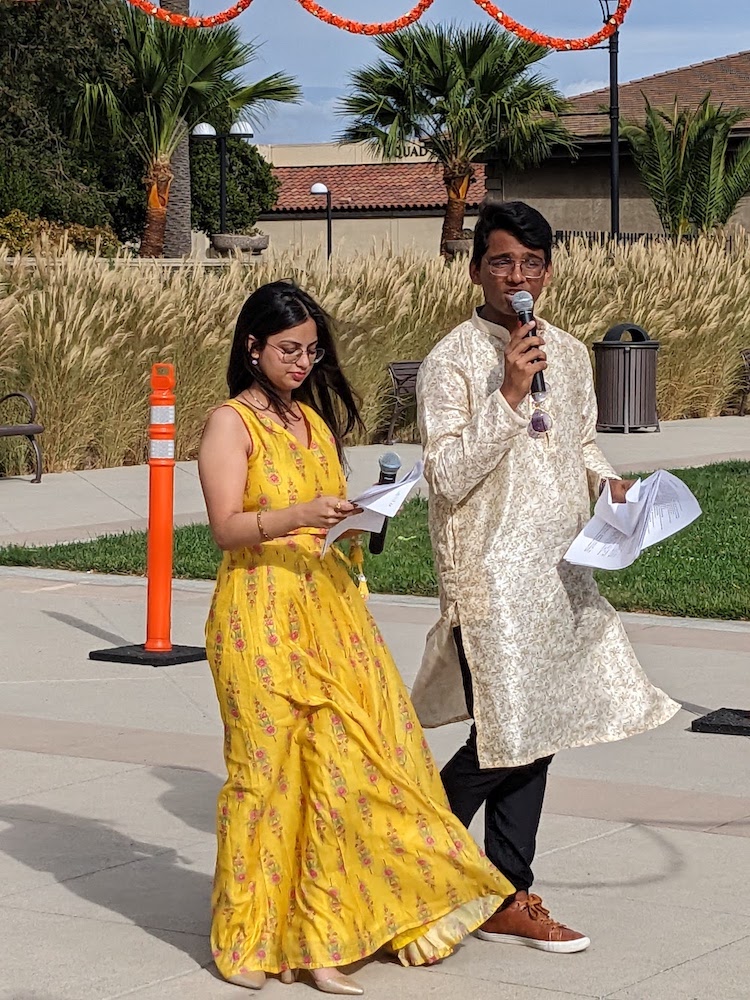 man and woman with microphones