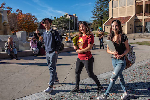 students walking in Sunken Garden